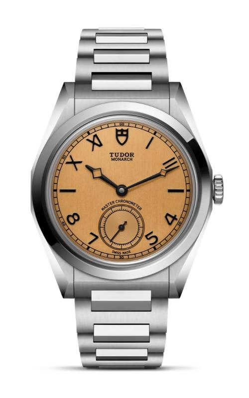 A TUDOR steel watch with a light brown dial, black numerals, and bold hour markers.