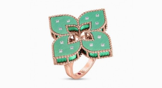 a green and rose gold cocktail ring by Roberto Coin featuring their iconic four-petaled flower shape.