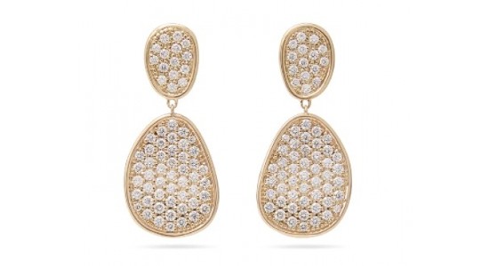a pair of bold, yellow gold drop earrings with pave-set diamonds.
