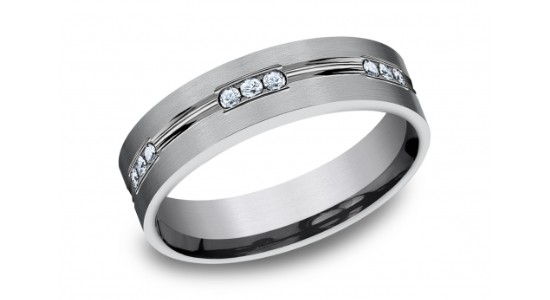A Tantalum men’s wedding band with round cut diamonds, available at Heller Jewelers.