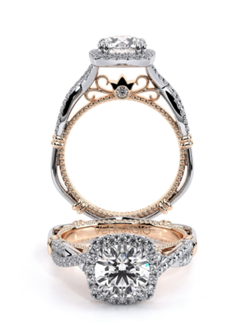 A rose gold diamond engagement ring with cathedral setting and intertwined band
