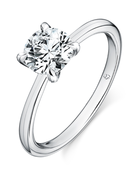A white gold solitaire engagement ring