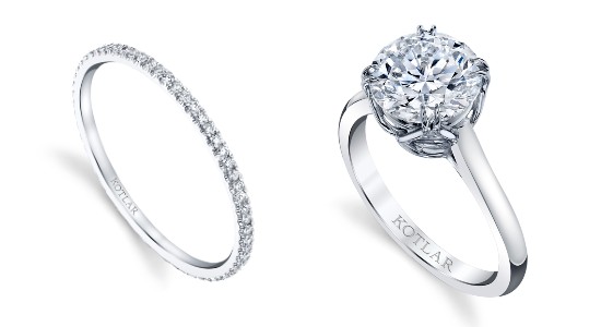 a platinum engagement ring next to a platinum diamond wedding band