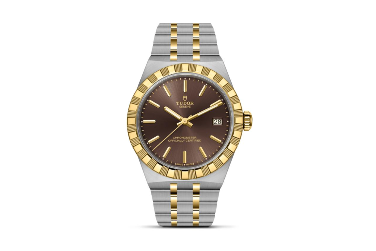 A TUDOR watch with a steel band with yellow gold accents, a yellow gold bezel, and a brown dial.