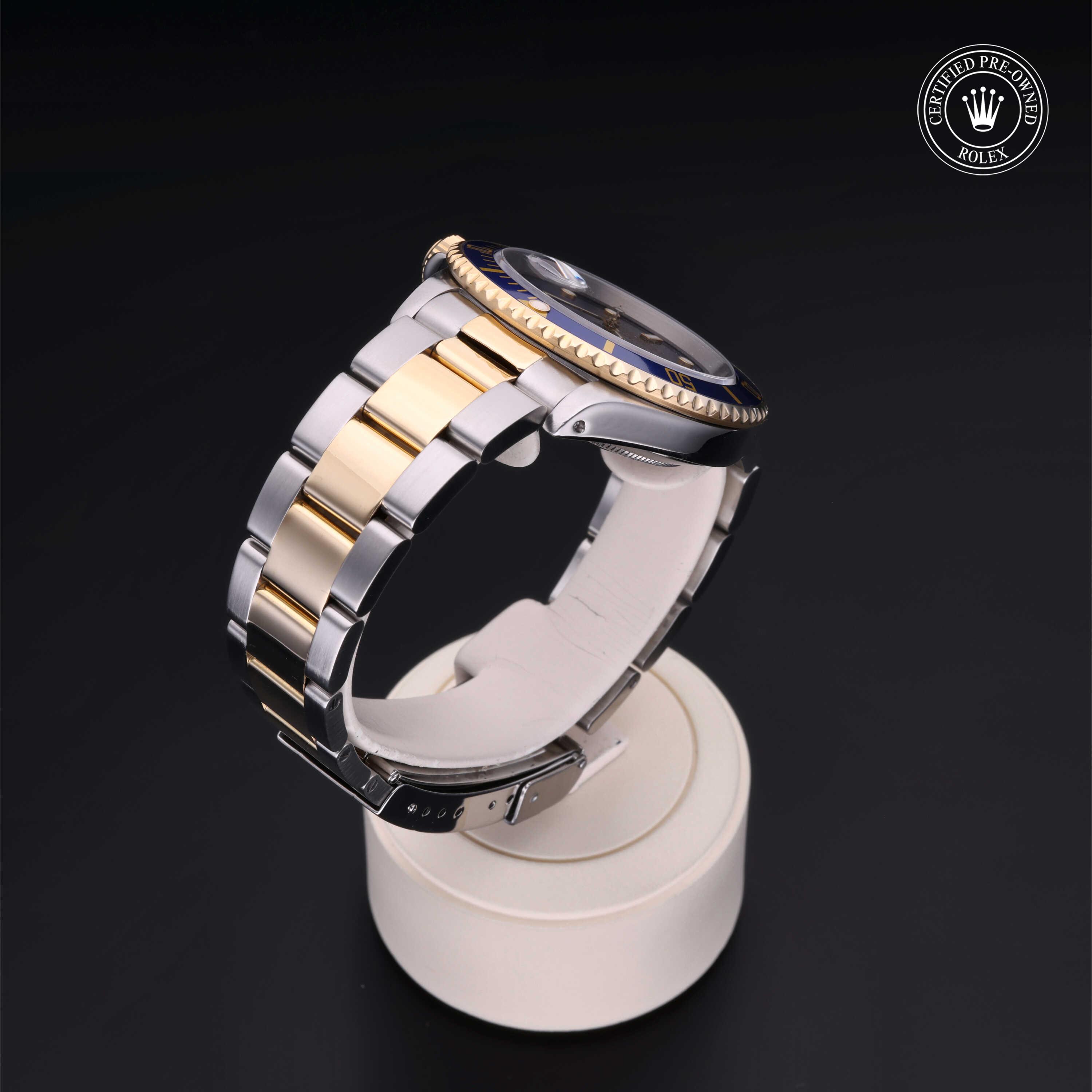 Rolex Submariner in Rolesor 18 Carat Yellow M16613-0012 at Heller Jewelers