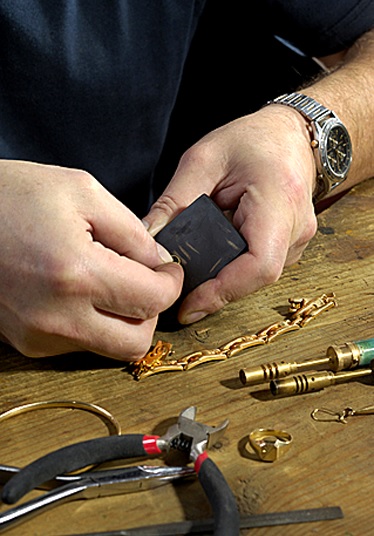 Jewelsmith Testing and Repairing a Watch Band